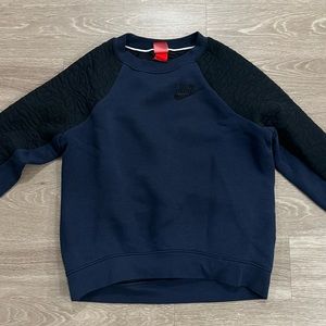Nike crew neck - size M. Never worn. Navy and black detail